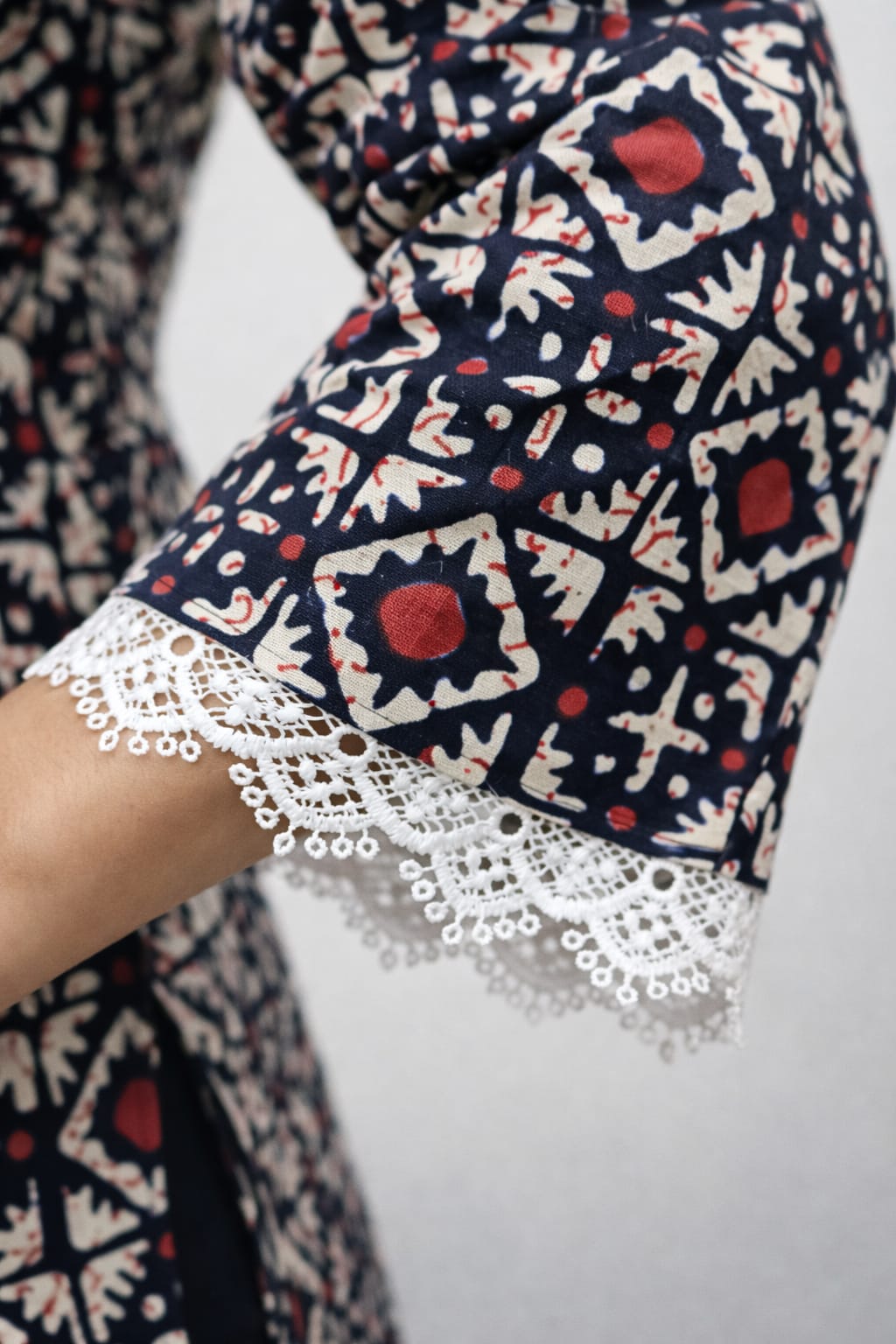 Black Geometric Print Short Kurti with Lace Detail & Bell Sleeves